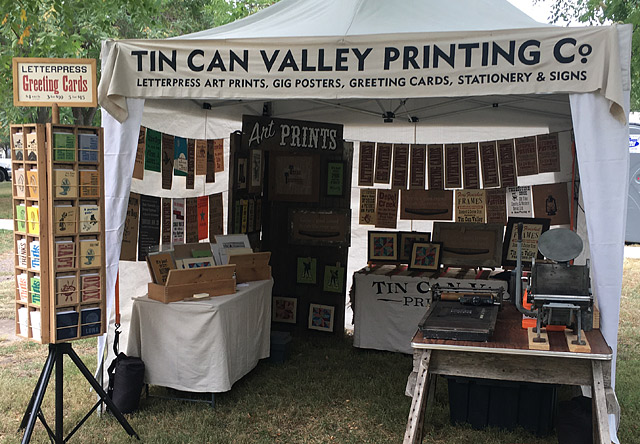 Tin Can Valley vendor booth setup with canopy